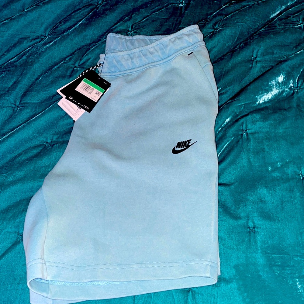 Men’s baby blue Nike tech shorts